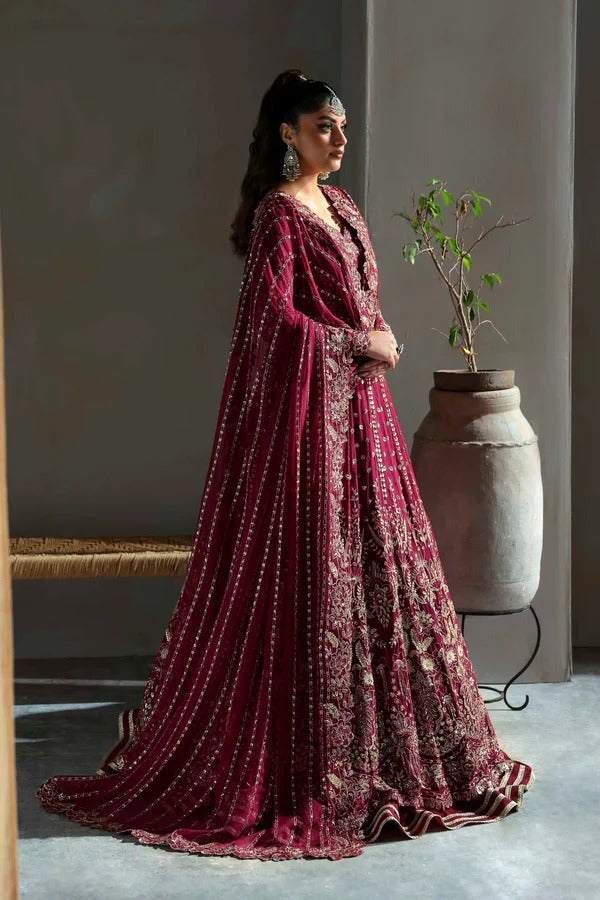 Graceful chiffon dress featuring 12" embroidered panels, elegant sleeves, and organza borders, paired with a matching dupatta and soft raw silk inner.