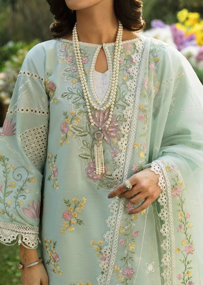 Elevate your style with this sky blue embroidered lawn suit featuring hand-work neckline, chikan-kari sleeves, net dupatta, and cotton trouser.