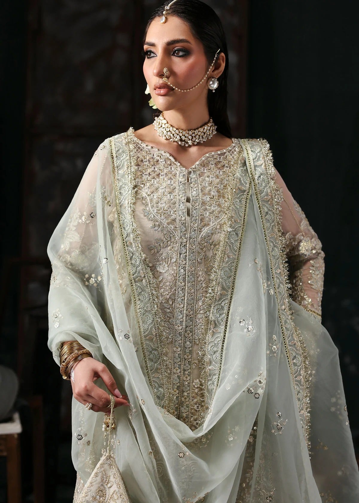 Elegant dusty white organza dress with embroidered panels, dupatta & raw silk trouser. Available stitched/unstitch with fast local & international delivery.