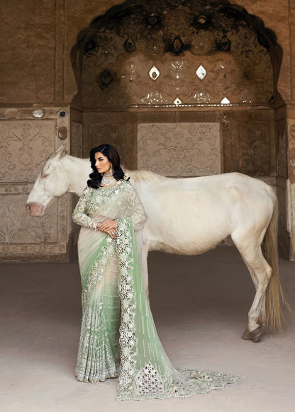 Stunning chiffon saree with gradient embroidery, diamante detailing, cutwork organza blouse with 3D flowers, and raw silk petticoat — perfect for weddings.