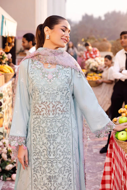 Elegant embroidered lawn suit with handwork neckline, chikan-kari panels, organza borders, woven net digital print dupatta, and cotton trouser.