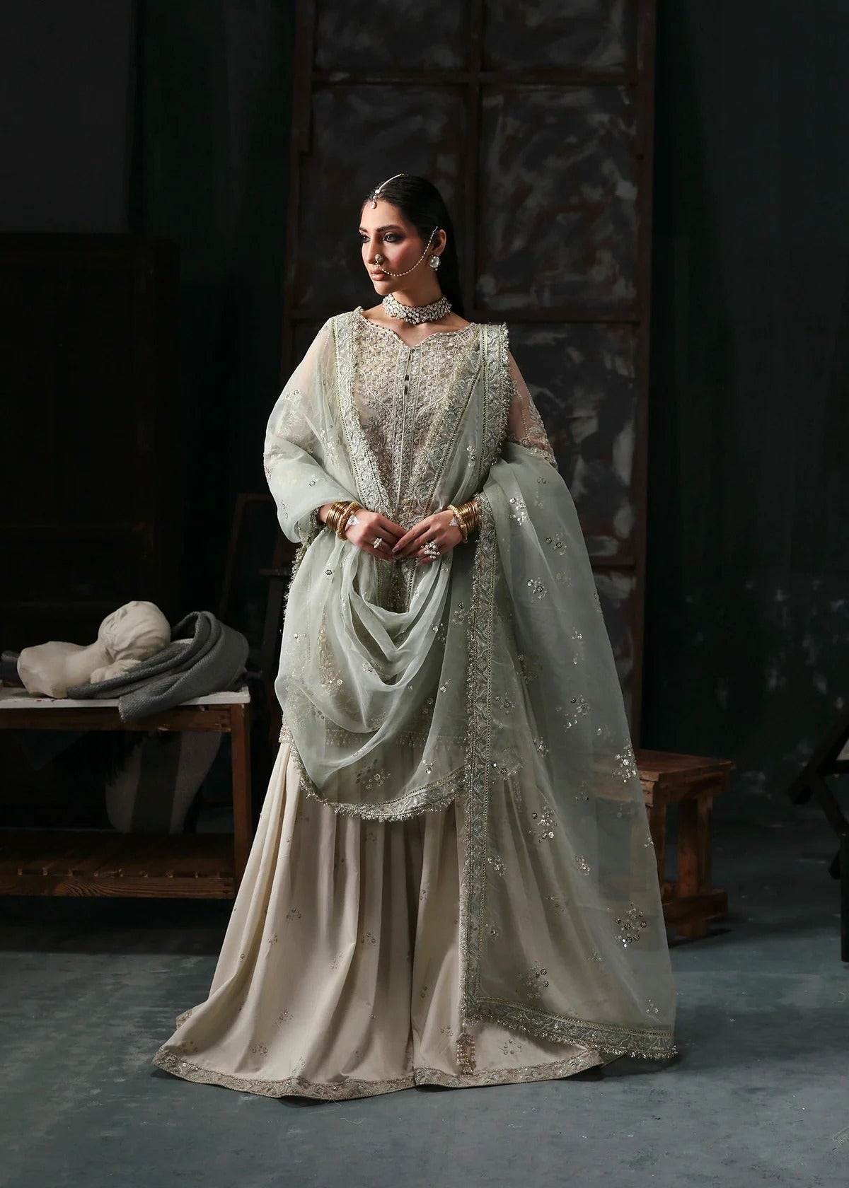 Elegant dusty white organza dress with embroidered panels, dupatta & raw silk trouser. Available stitched/unstitch with fast local & international delivery.