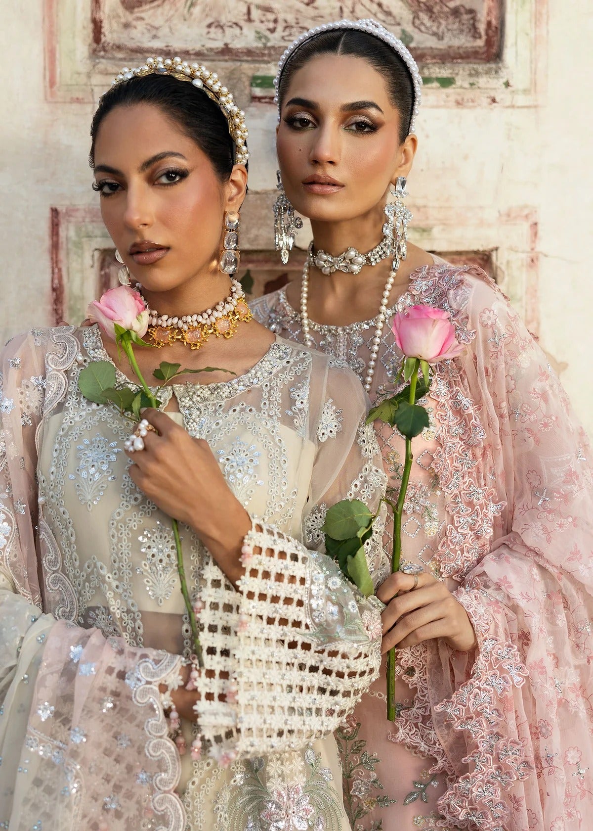 Luxury chiffon suit with 3D embellished front, organza cutwork borders, embroidered chiffon dupatta, and raw silk trouser — perfect for weddings & parties.