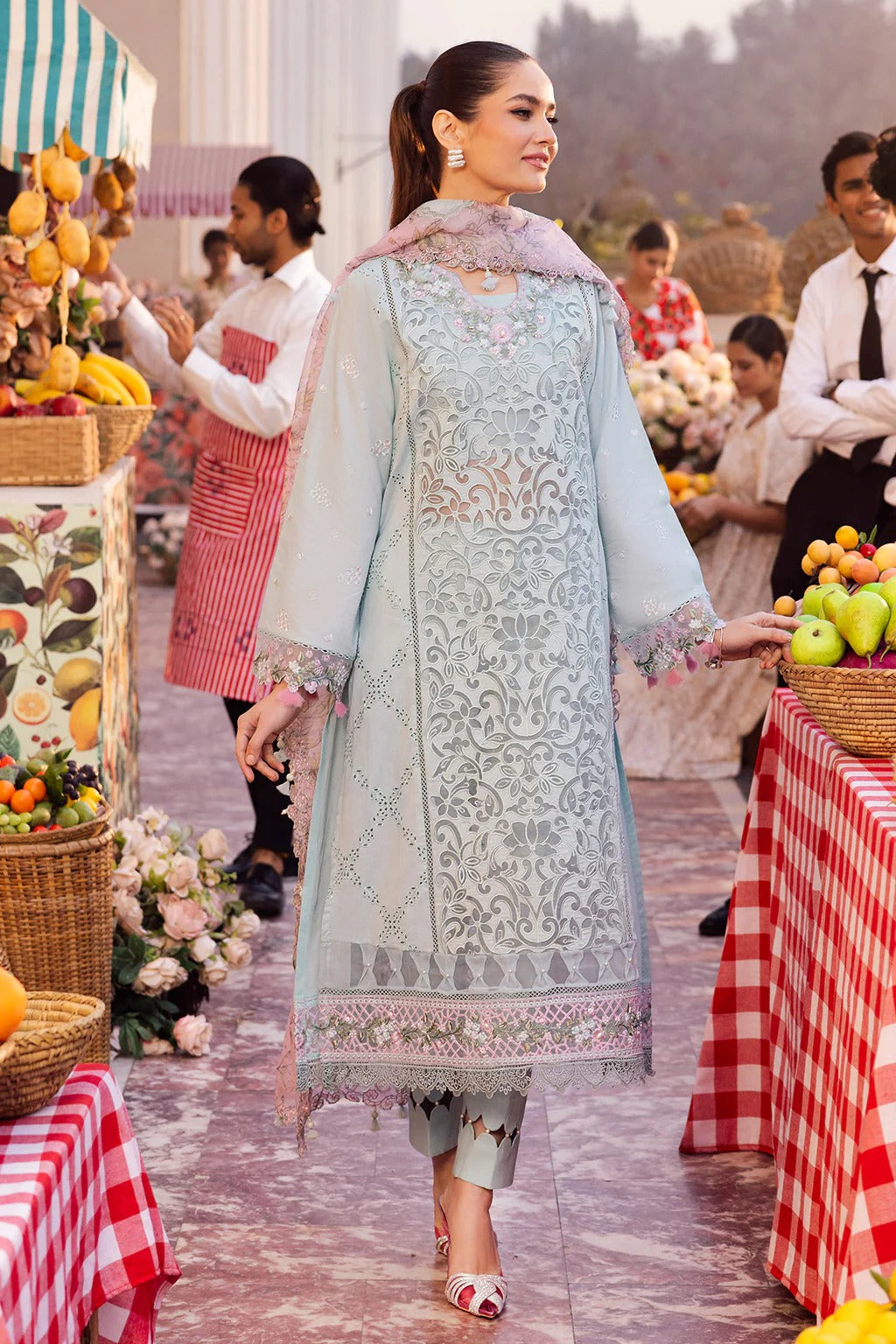Elegant embroidered lawn suit with handwork neckline, chikan-kari panels, organza borders, woven net digital print dupatta, and cotton trouser.