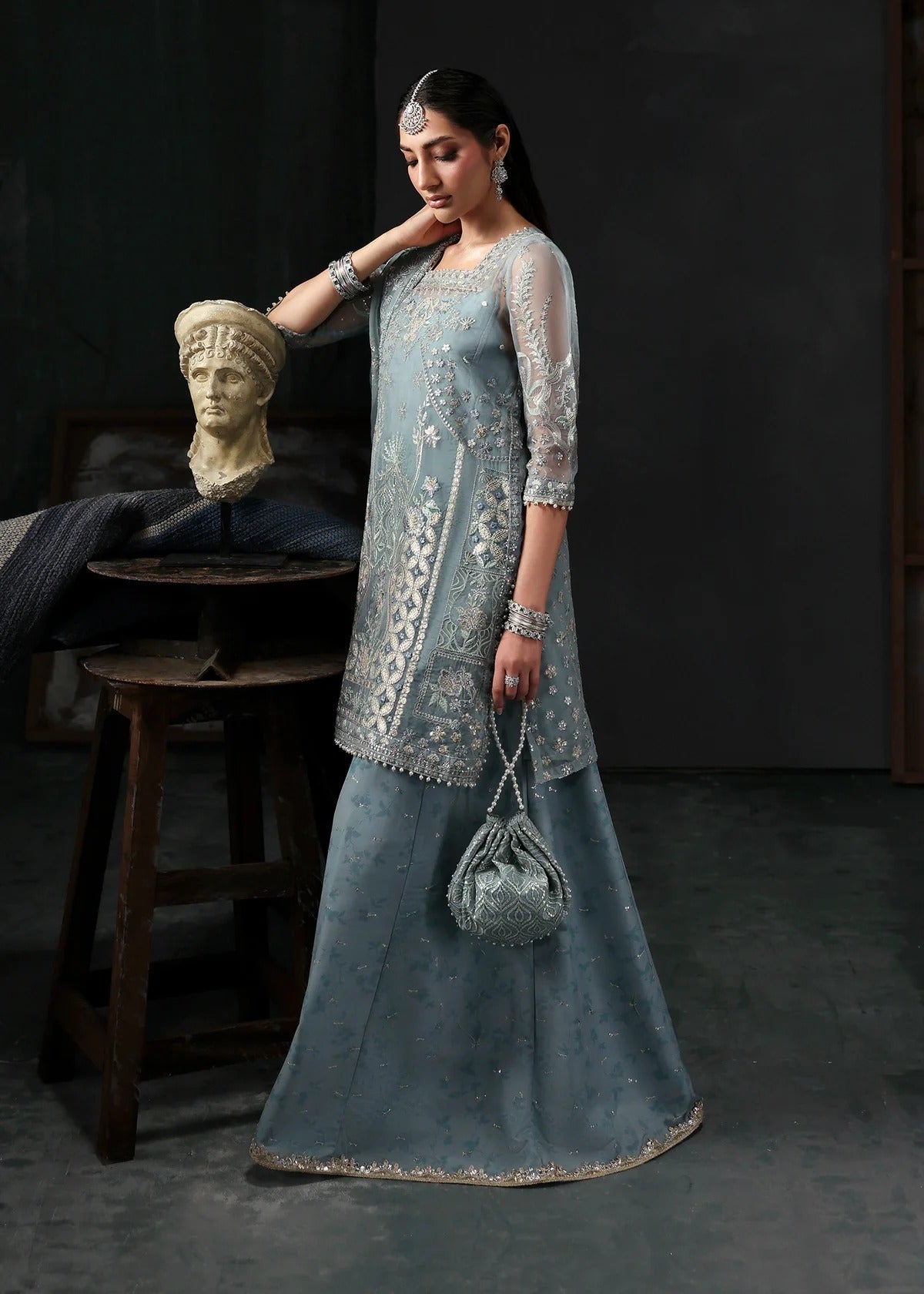Chic ice blue organza dress with embroidered panels, dupatta & raw silk trouser. Available stitched/unstitch with custom sizing & worldwide delivery.