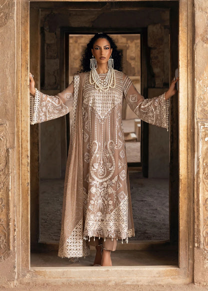 Exquisite chiffon suit with luxury hand embellishment, cutwork organza borders, embroidered dupatta, and raw silk trouser — ideal for weddings & parties.