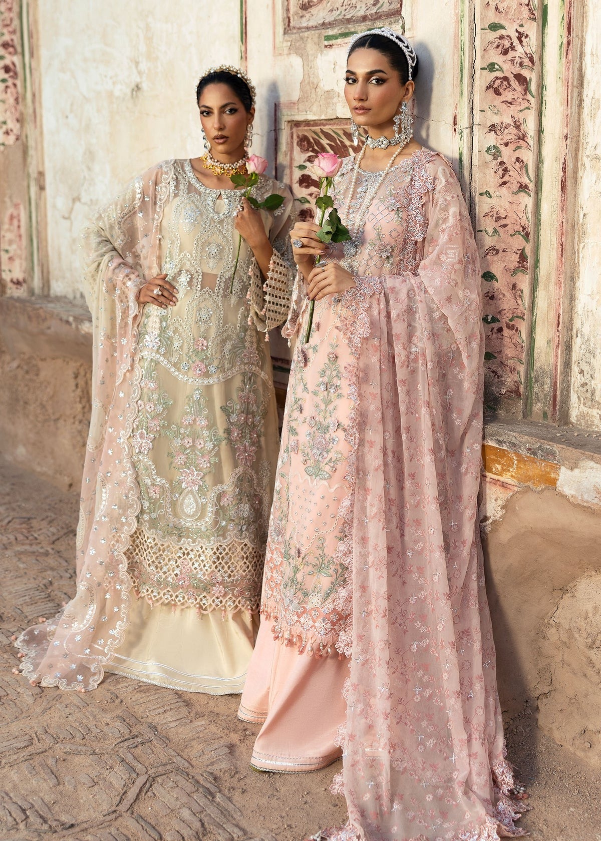 Luxury chiffon suit with 3D embellished front, organza cutwork borders, embroidered chiffon dupatta, and raw silk trouser — perfect for weddings & parties.