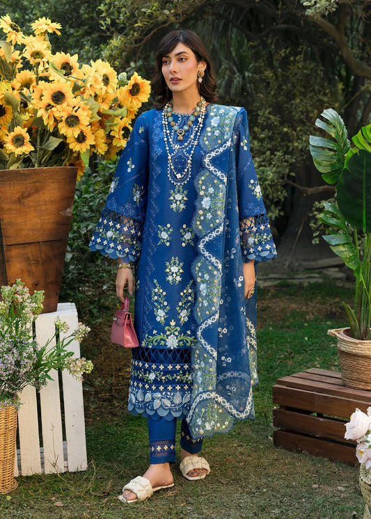 Step into elegance with this blue embroidered lawn suit featuring chikan-kari panels, hand-work neckline, net dupatta, and cotton trouser.