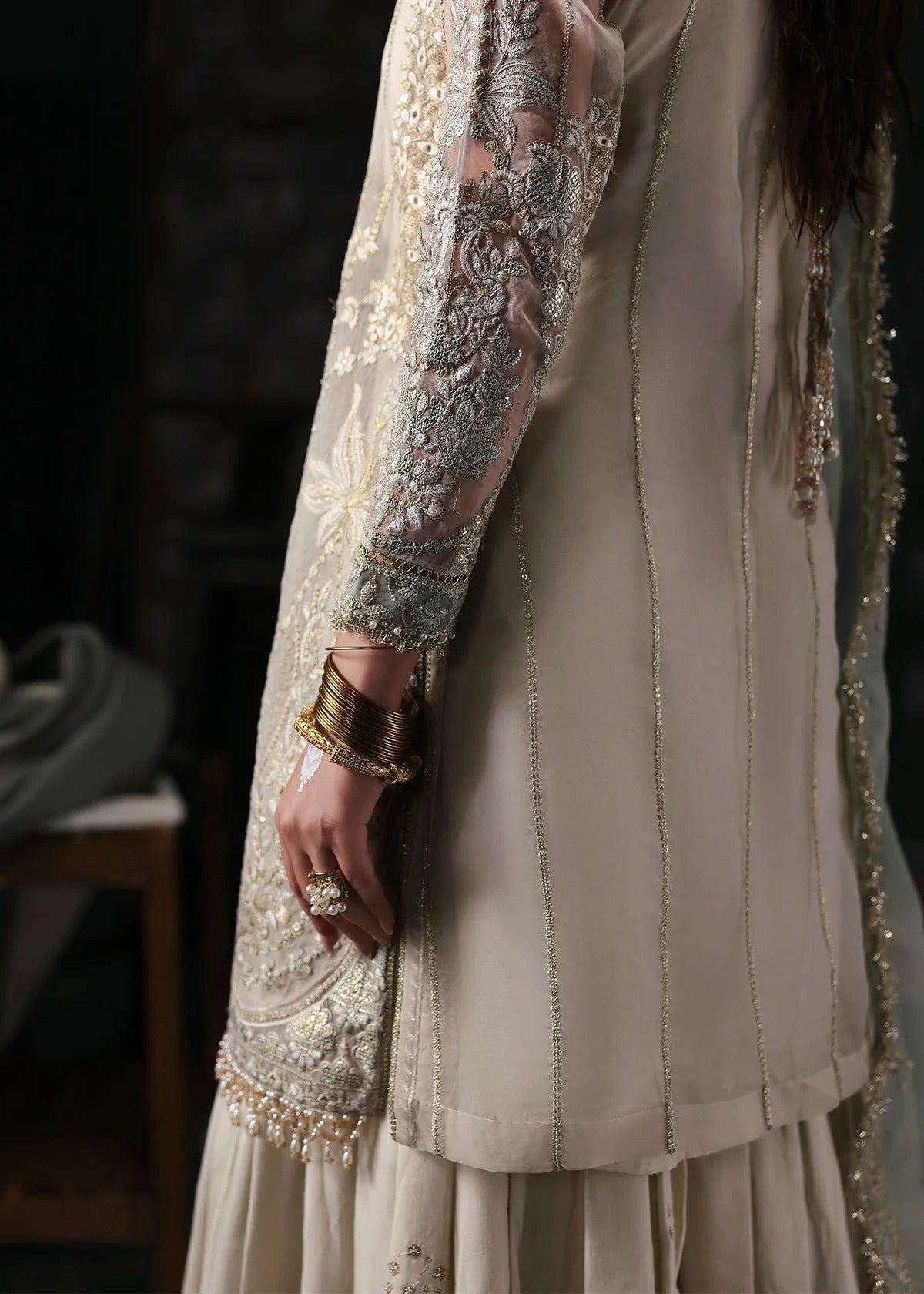 Elegant dusty white organza dress with embroidered panels, dupatta & raw silk trouser. Available stitched/unstitch with fast local & international delivery.
