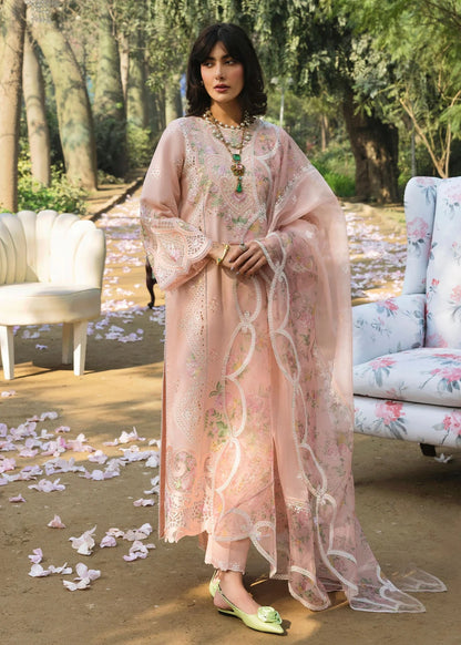 Grace your look with this peach embroidered lawn suit featuring chikan-kari panels, hand-work neckline, net dupatta, and cotton trouser.