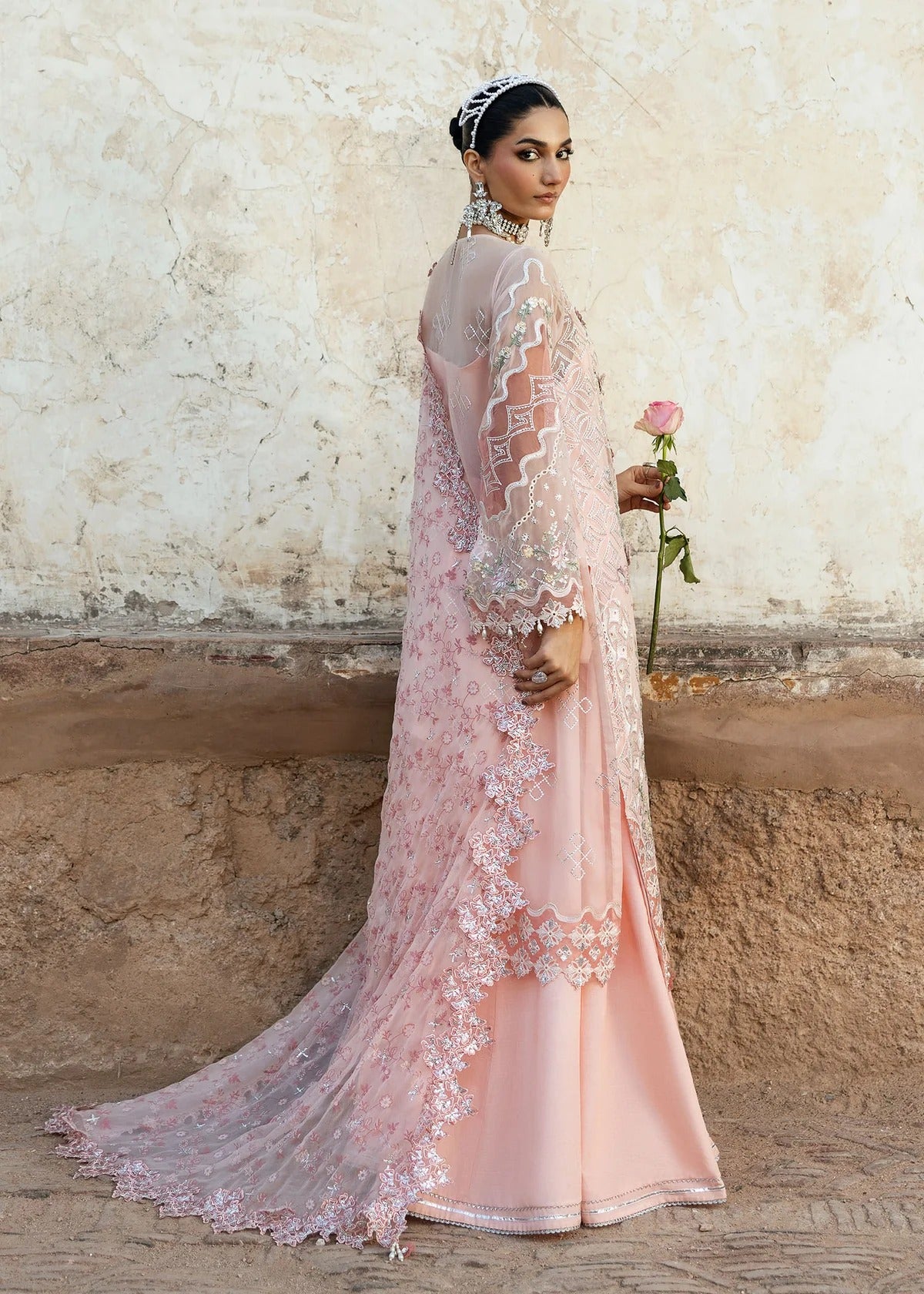 Luxury chiffon suit with 3D embellished front, organza cutwork borders, embroidered chiffon dupatta, and raw silk trouser — perfect for weddings & parties.