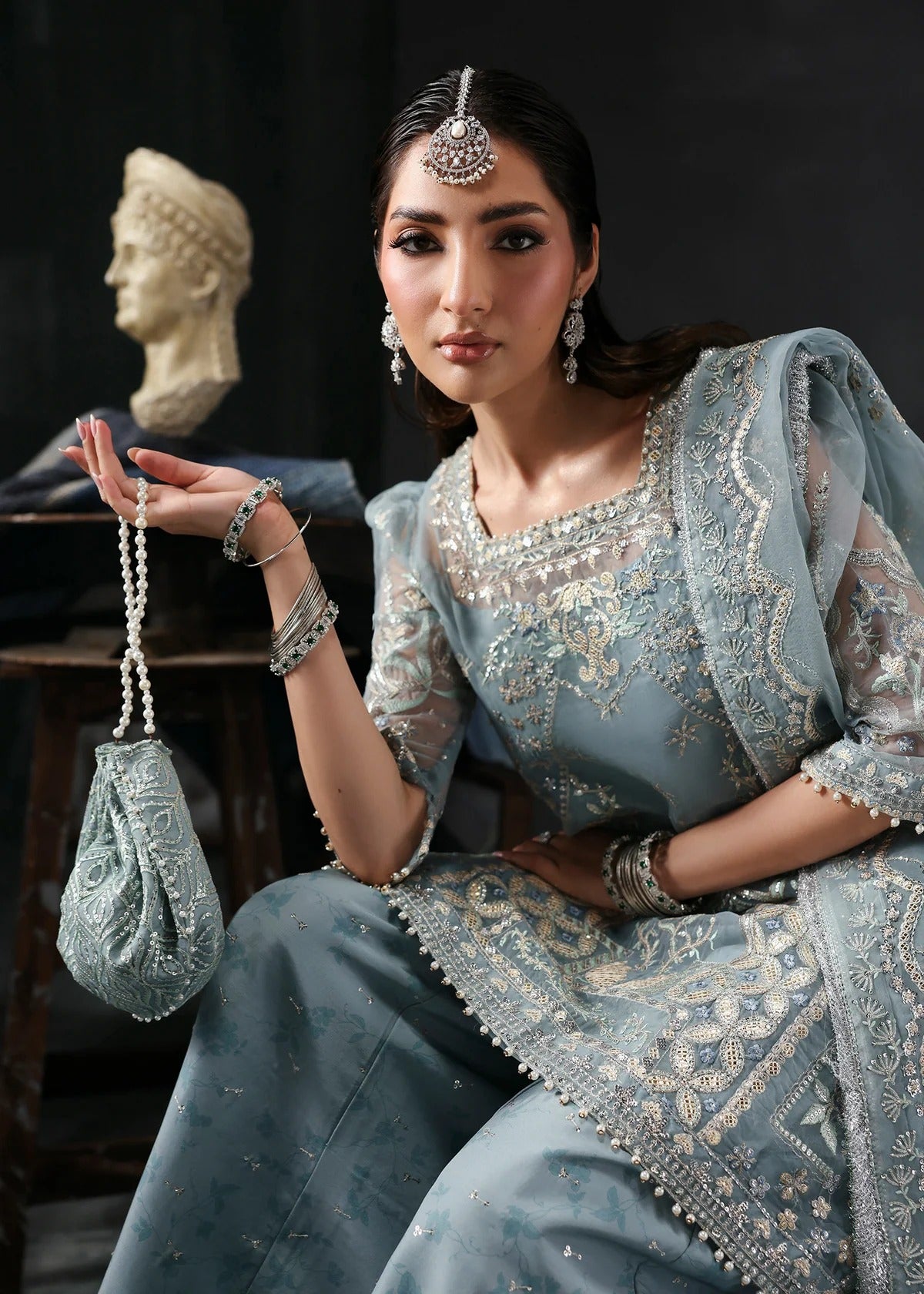 Chic ice blue organza dress with embroidered panels, dupatta & raw silk trouser. Available stitched/unstitch with custom sizing & worldwide delivery.