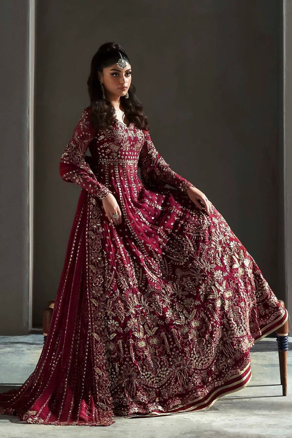 Graceful chiffon dress featuring 12" embroidered panels, elegant sleeves, and organza borders, paired with a matching dupatta and soft raw silk inner.