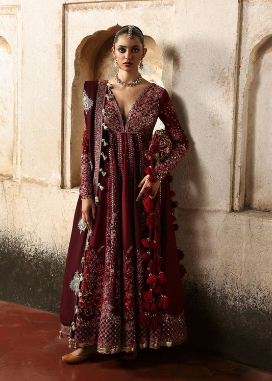 Elegant burgundy and maroon Korean raw silk pishwas with rich embroidery and matching churidar. Unstitched luxury outfit for timeless royal grace.