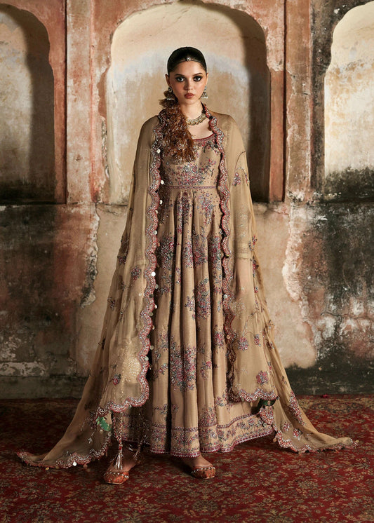 Graceful beige Korean raw silk pishwas with maroon churidar and chiffon dupatta. Elegant unstitched outfit perfect for weddings and festive wear.