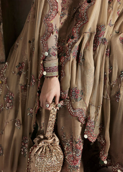 Graceful beige Korean raw silk pishwas with maroon churidar and chiffon dupatta. Elegant unstitched outfit perfect for weddings and festive wear.