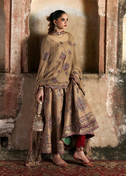 Graceful beige Korean raw silk pishwas with maroon churidar and chiffon dupatta. Elegant unstitched outfit perfect for weddings and festive wear.