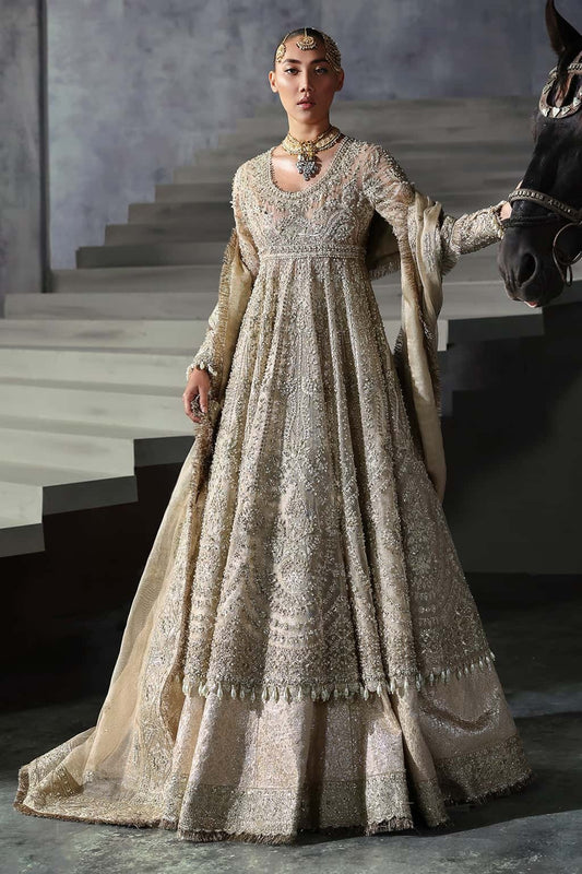 Elegant khaddi net suit featuring hand-embellished panels, embroidered dupatta with four-side border, and jamavar trouser for a timeless festive look.