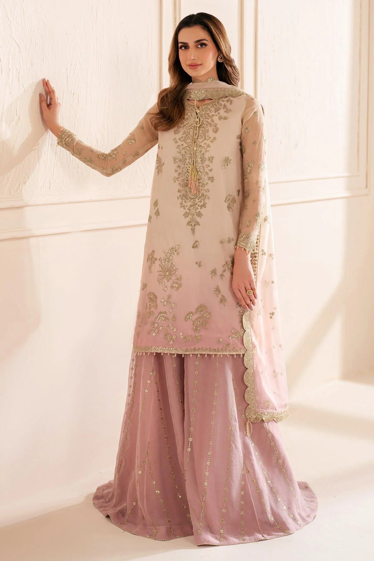 UC-3067 features digital printed chiffon with fine embroidery on front, sleeves, and dupatta—paired with a dyed rawsilk bottom for a refined look.