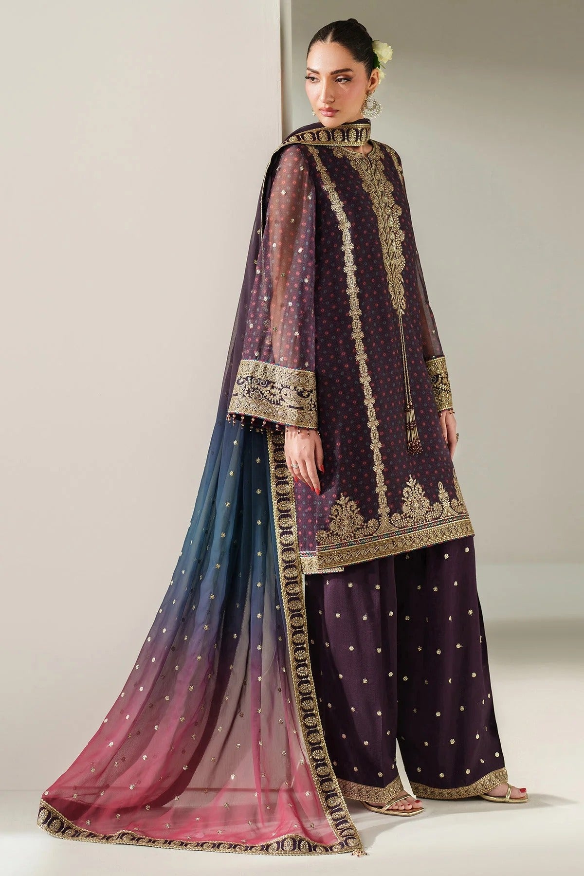 Elegantly embroidered chiffon with digital prints, bordered dupatta, and raw silk bottom—crafted for refined charm at weddings, events, or formal soirées.