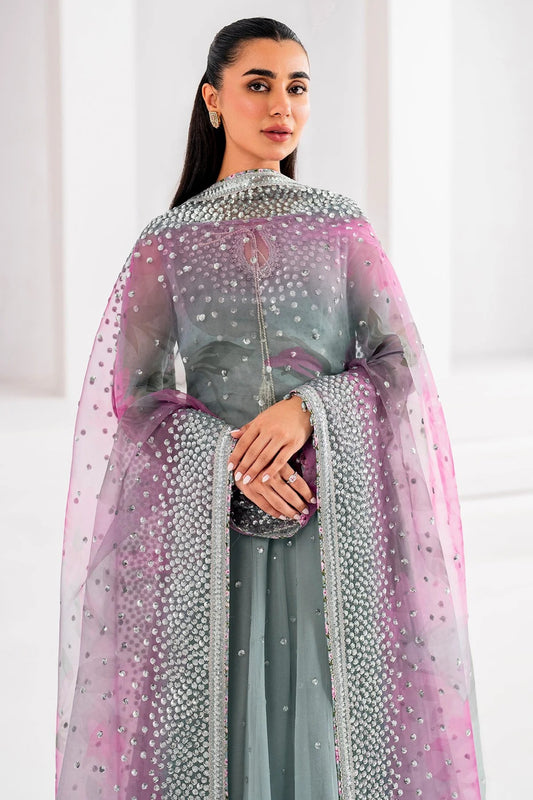 UC-3062 blends embroidered chiffon with digital prints, organza dupatta, and rawsilk trouser—crafted for elegance and perfect for formal occasions.