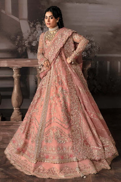 Luxurious organza suit with hand-embellished panels, embroidered dupatta, and raw silk trouser — perfect for weddings and festive wear.