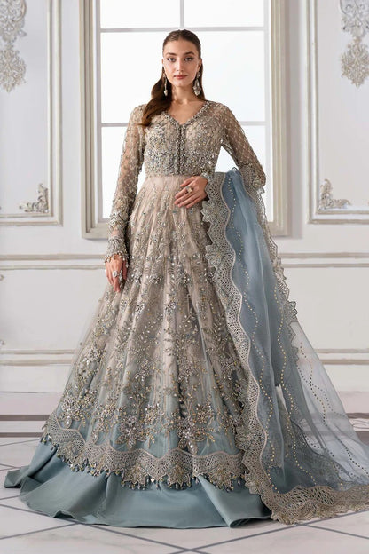 Elegant net ensemble with hand-embellished bodice, organza dupatta, and raw silk base. Perfect for weddings and formal wear. Color may slightly vary.