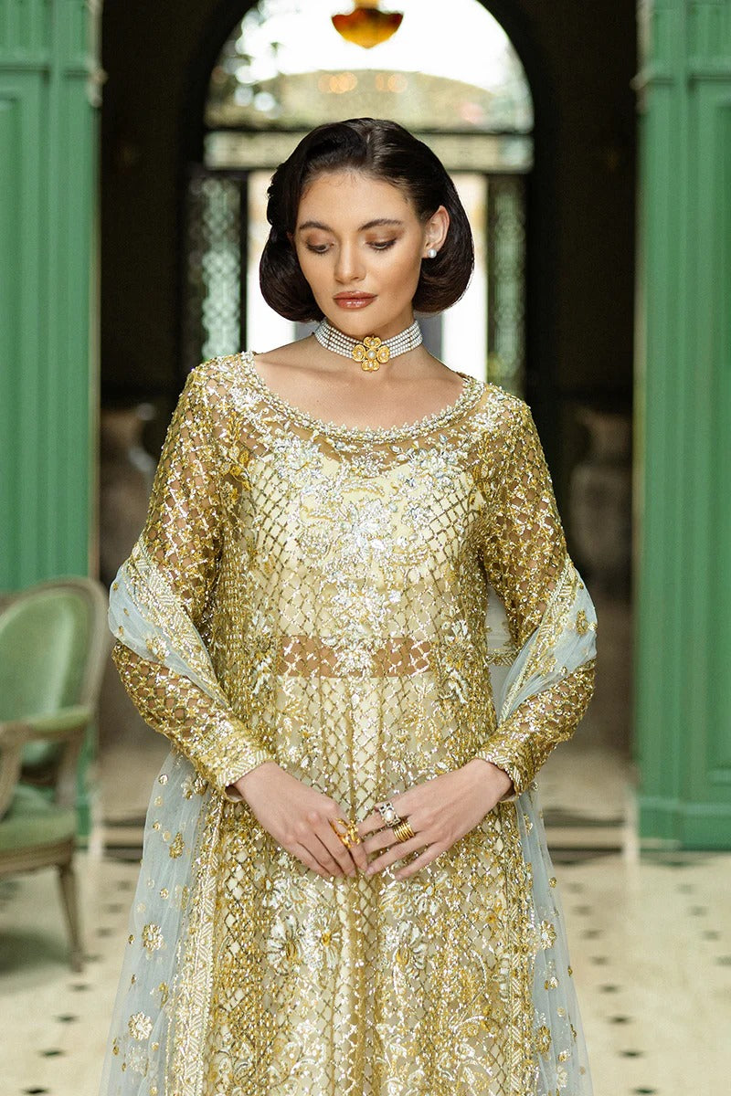 Elegant white & gold dress with embroidered net shirt, sequined dupatta, raw silk trouser, jamawar finishing, and hand-embellished neckline.