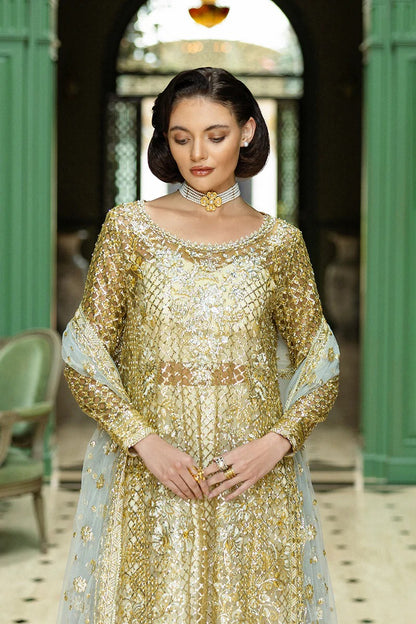Elegant white & gold dress with embroidered net shirt, sequined dupatta, raw silk trouser, jamawar finishing, and hand-embellished neckline.