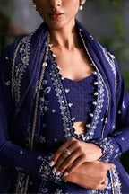Sophisticated navy blue silk suit with embroidered panels, elegant organza dupatta, and silk trouser. Perfect for festive and formal occasion