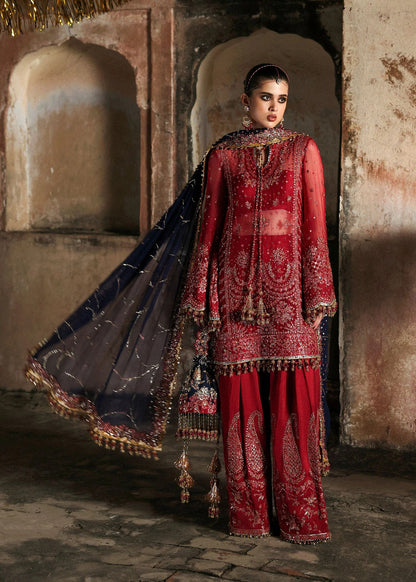 Stunning cherry red chiffon shirt with rich embroidery, silk shalwar, and chiffon dupatta. Unstitched festive outfit radiating elegance and timeless grace.