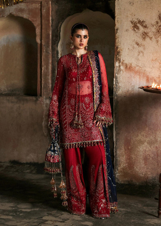 Stunning cherry red chiffon shirt with rich embroidery, silk shalwar, and chiffon dupatta. Unstitched festive outfit radiating elegance and timeless grace.
