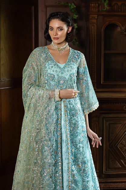 Elegant aqua blue dress with embroidered net shirt, sequined dupatta, printed lehenga, golden samosa lace, and delicate hand embellishments.