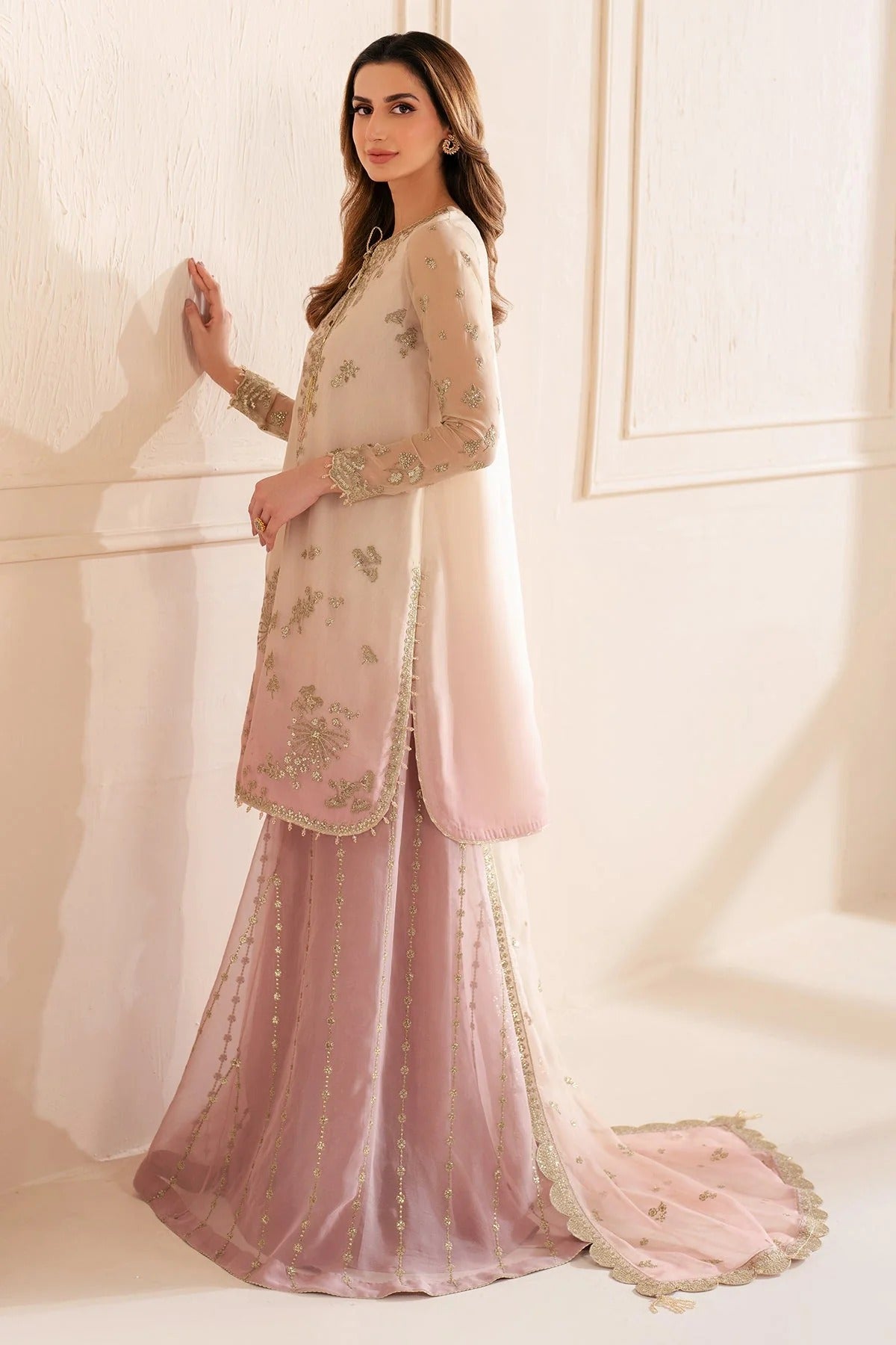 UC-3067 features digital printed chiffon with fine embroidery on front, sleeves, and dupatta—paired with a dyed rawsilk bottom for a refined look.