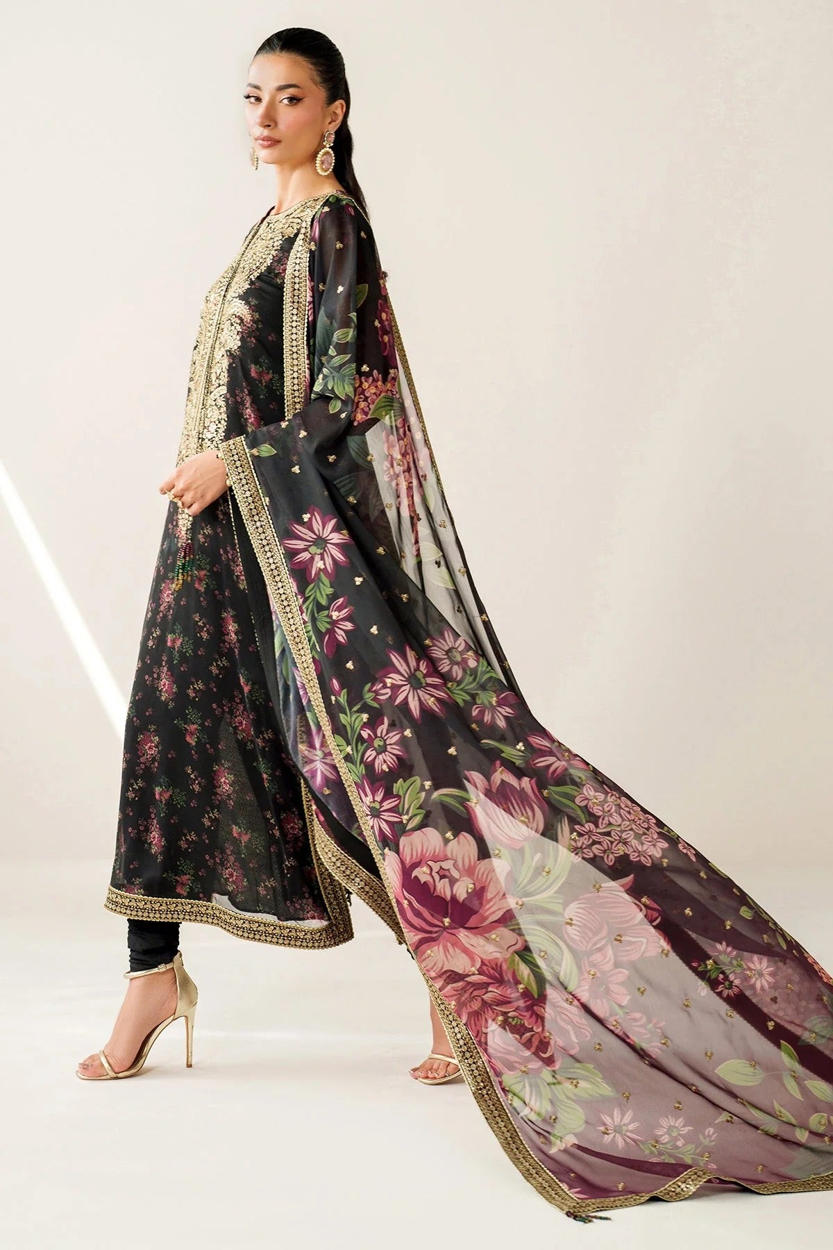 Digitally printed chiffon suit with intricate embroidery, bordered dupatta, and raw silk bottom—perfect for a graceful, formal, and timeless look.