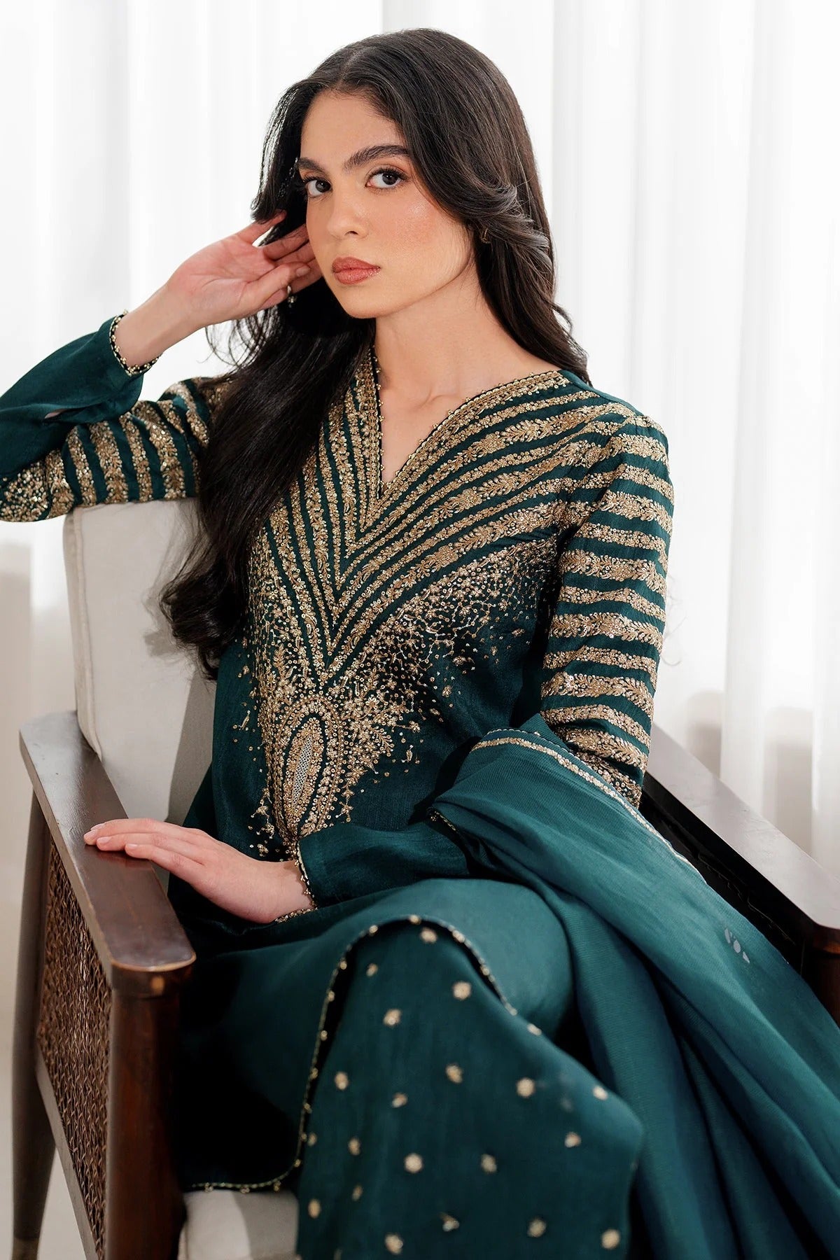 UR-7056 features embroidered Korean rawsilk front, sleeves, and bottom with a check woven organza dupatta—crafted for elegant, formal occasions.