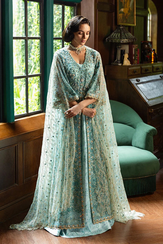 Elegant aqua blue dress with embroidered net shirt, sequined dupatta, printed lehenga, golden samosa lace, and delicate hand embellishments.