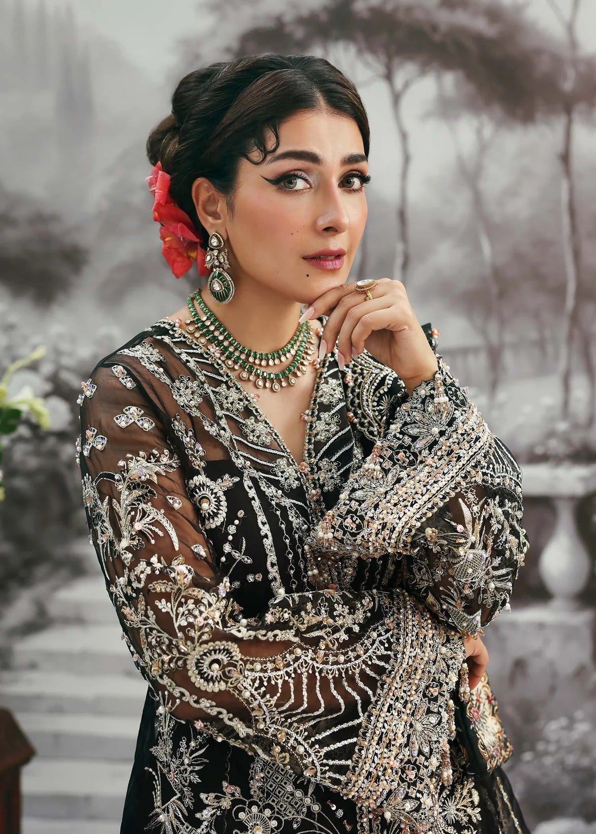 Majestic onyx noir suit with hand-embellished organza panels, refined borders, embroidered dupatta, and sleek trouser for timeless evening elegance.