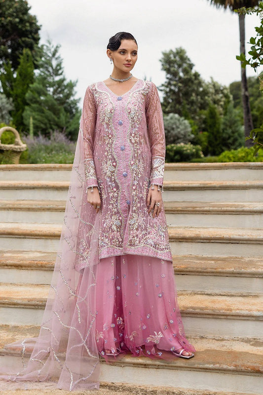 Stylish light pink dress with embroidered net shirt, sequined dupatta, embellished trouser, silk neckline, and handmade tassels for an elegant look.