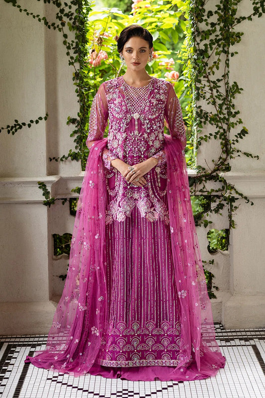 Graceful blush pink dress with embroidered net shirt, sequined dupatta, raw silk trouser, pearl-detailed daman border, and handmade tassels.