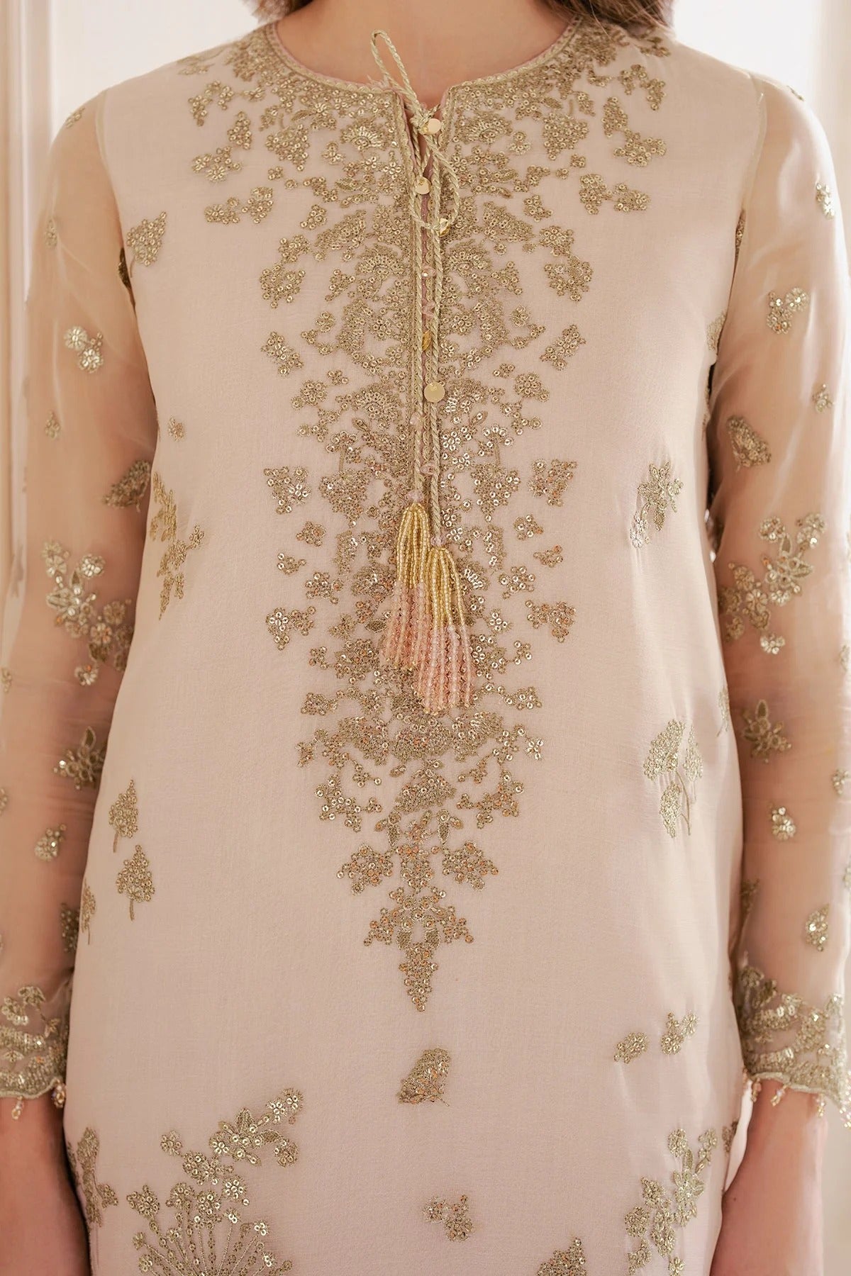 UC-3067 features digital printed chiffon with fine embroidery on front, sleeves, and dupatta—paired with a dyed rawsilk bottom for a refined look.