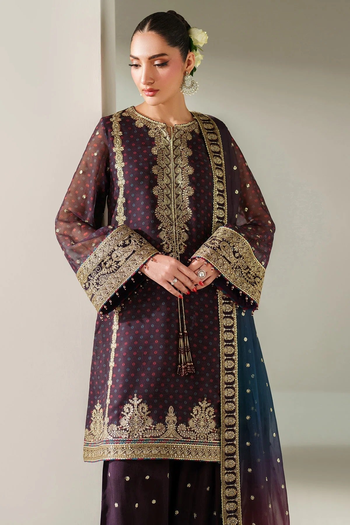 Elegantly embroidered chiffon with digital prints, bordered dupatta, and raw silk bottom—crafted for refined charm at weddings, events, or formal soirées.