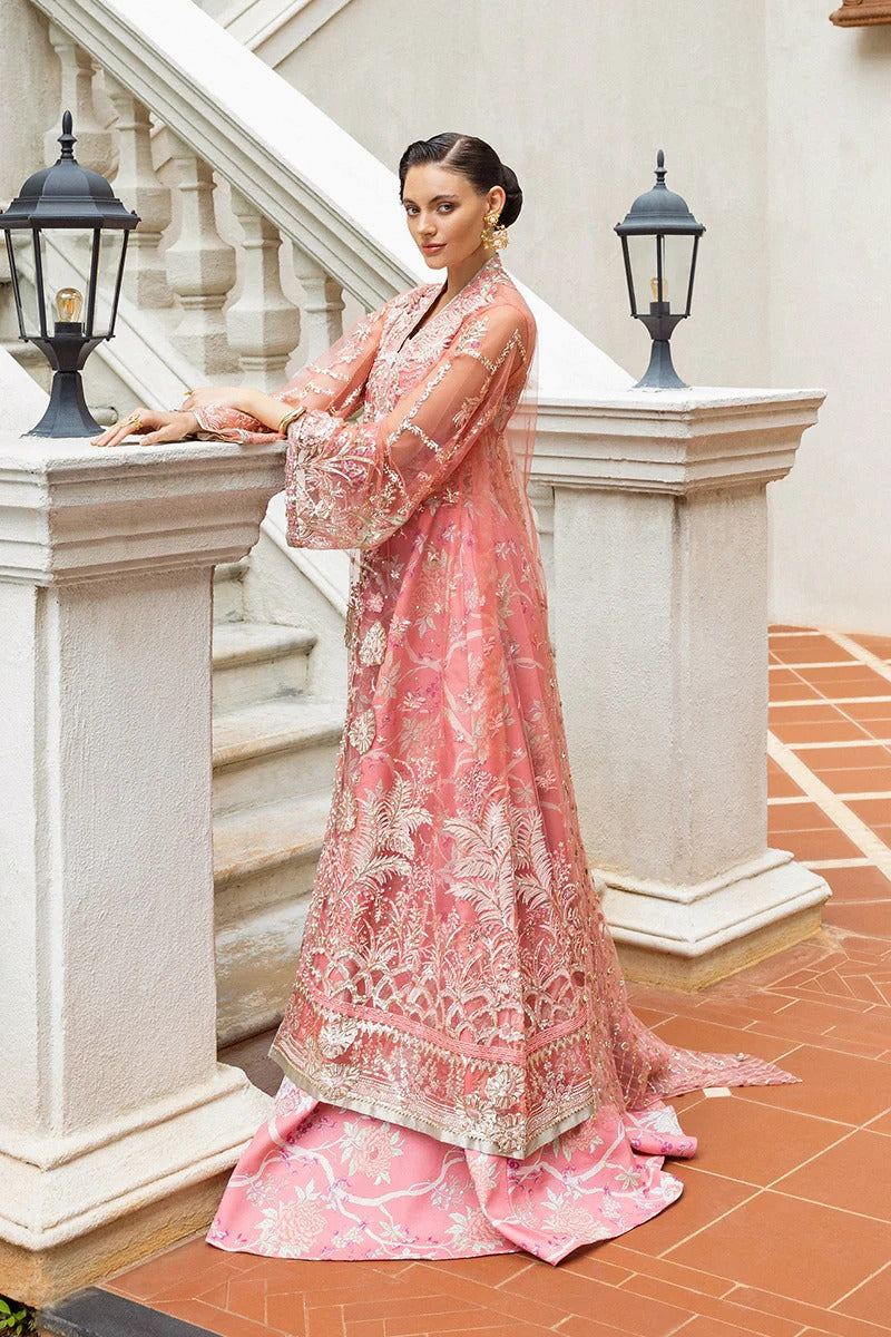 Elegant coral dress with embroidered net shirt, sequined dupatta, raw silk trouser, 3D bird embellishments, and handmade tassels for luxury style.