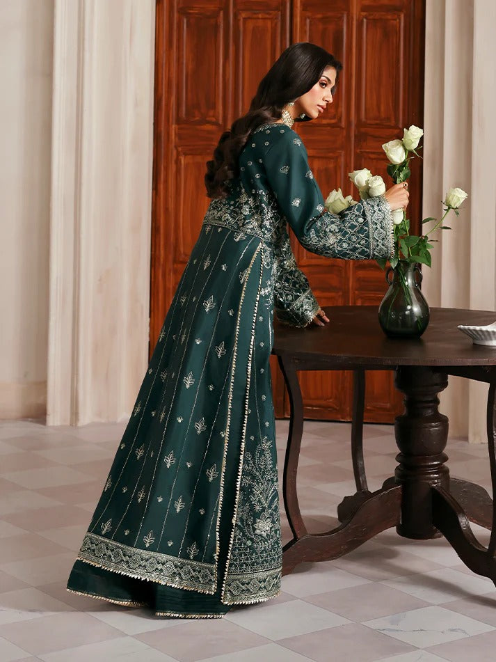 Elevate your look with this embroidered and sequined raw silk ensemble featuring a detailed bodice, chiffon dupatta with organza border, and elegant sharara.