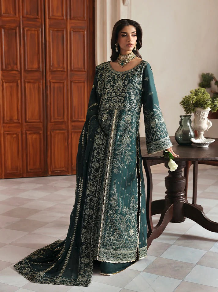 Elevate your look with this embroidered and sequined raw silk ensemble featuring a detailed bodice, chiffon dupatta with organza border, and elegant sharara.