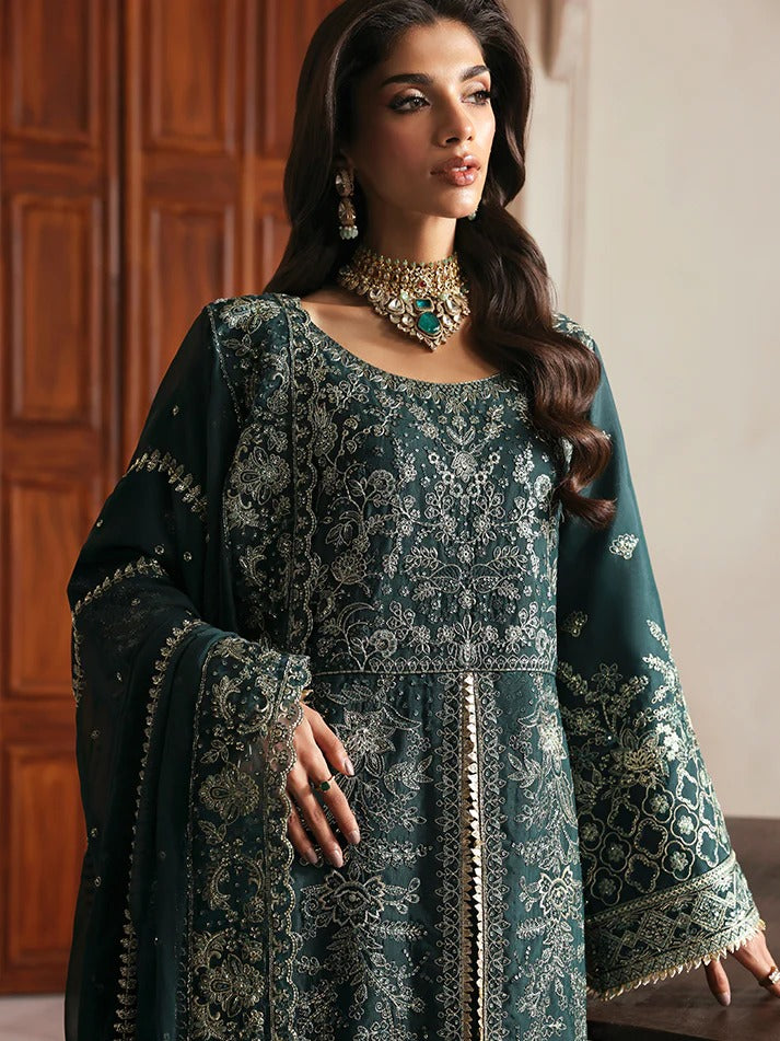 Elevate your look with this embroidered and sequined raw silk ensemble featuring a detailed bodice, chiffon dupatta with organza border, and elegant sharara.