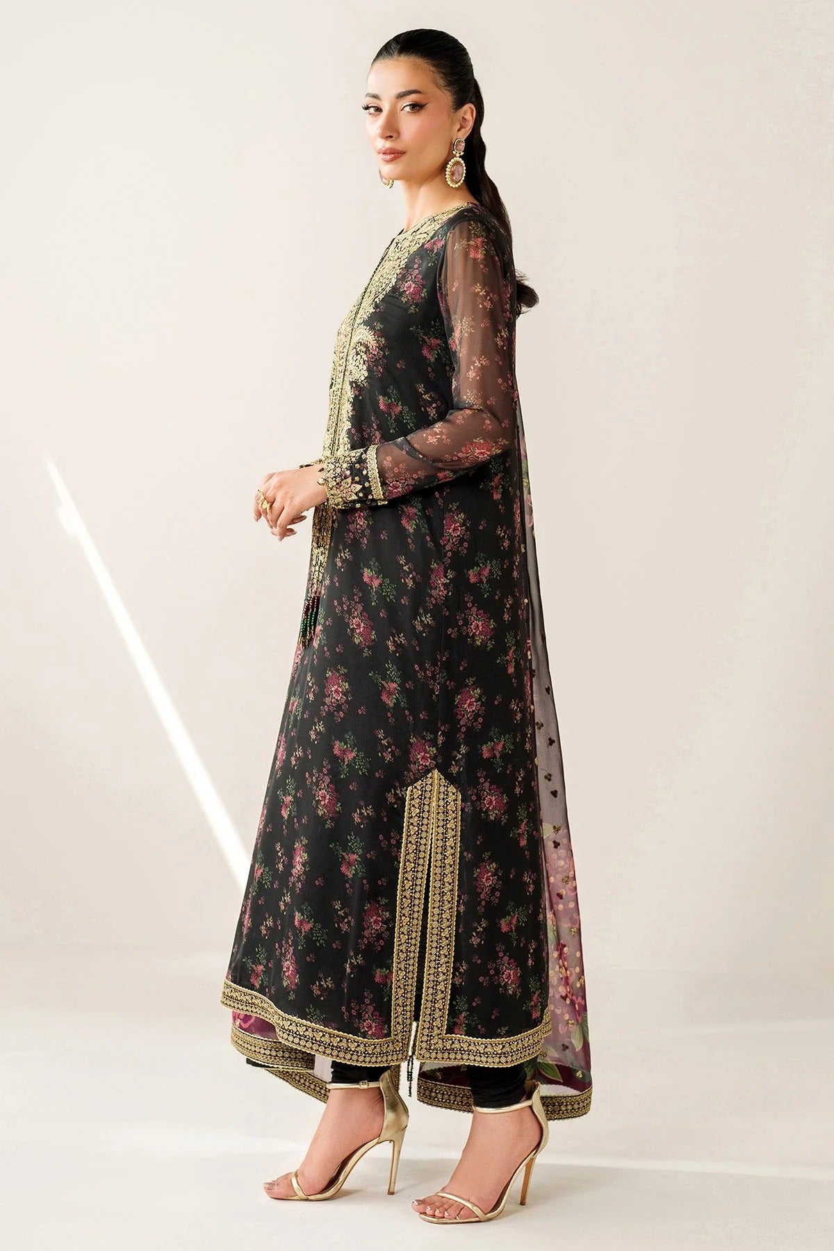 Digitally printed chiffon suit with intricate embroidery, bordered dupatta, and raw silk bottom—perfect for a graceful, formal, and timeless look.