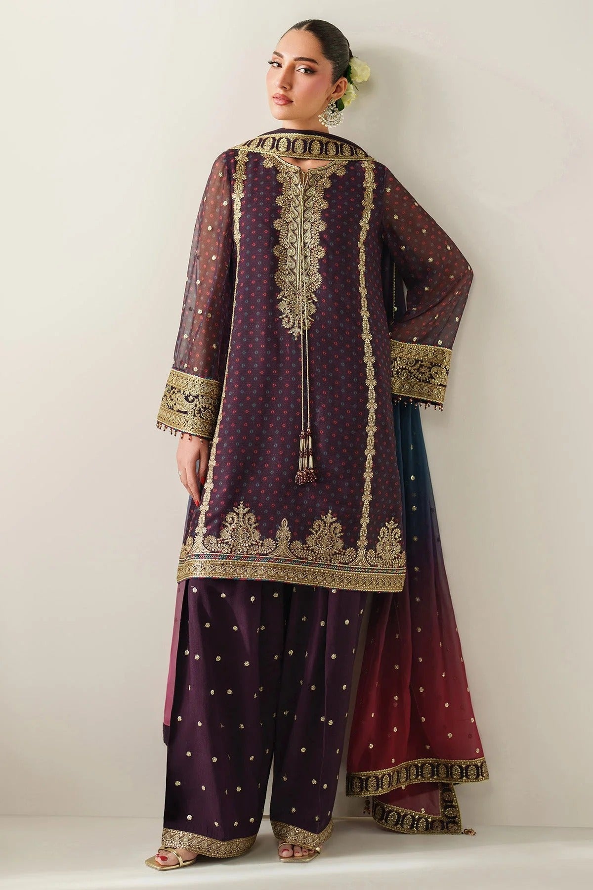 Elegantly embroidered chiffon with digital prints, bordered dupatta, and raw silk bottom—crafted for refined charm at weddings, events, or formal soirées.