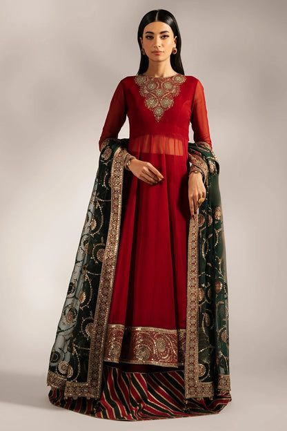 UC-3074 features embroidered chiffon yoke, dupatta, and borders with dyed chiffon panels and rawsilk bottom. A perfect pick for graceful, formal occasions.