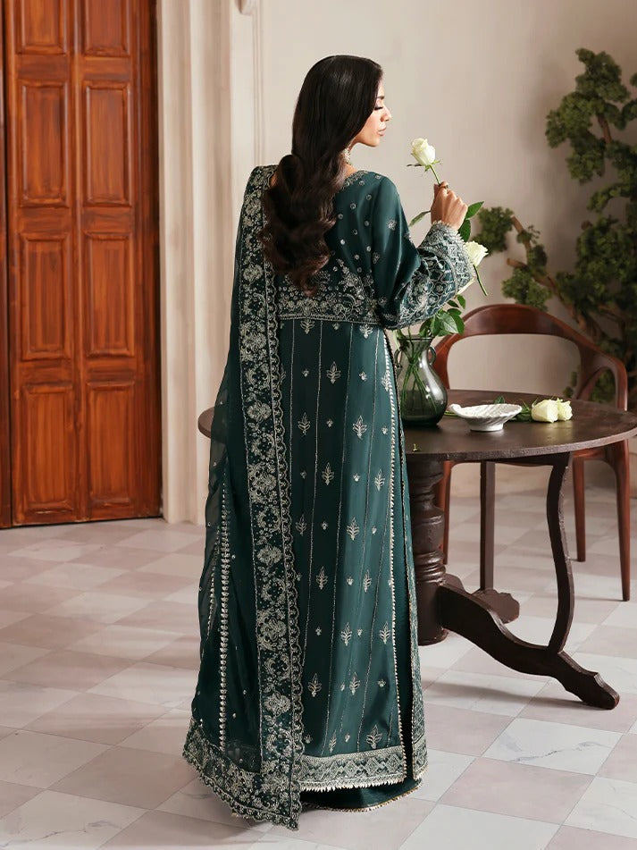 Elevate your look with this embroidered and sequined raw silk ensemble featuring a detailed bodice, chiffon dupatta with organza border, and elegant sharara.